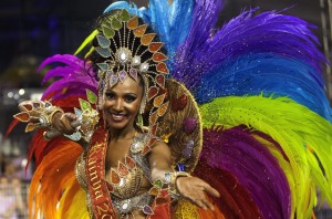 A member of samba school Imperio de Casa Verde takes part in a carnival parade at Anhembi Sambodrome during second day of Brazilian carnival in Sao Paulo, Brazil, early morning 15 February 2015. (Photo by Bosco Martin/EPA)
